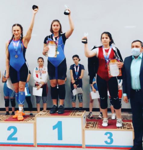 Medals and cups of our athletes at regional weightlifting competitions